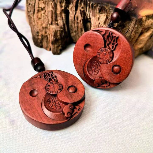Cinnabar wood pendant struck by lightning
